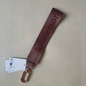 Lululemon Never Lost Keychain - Red Clay/Rose Gold